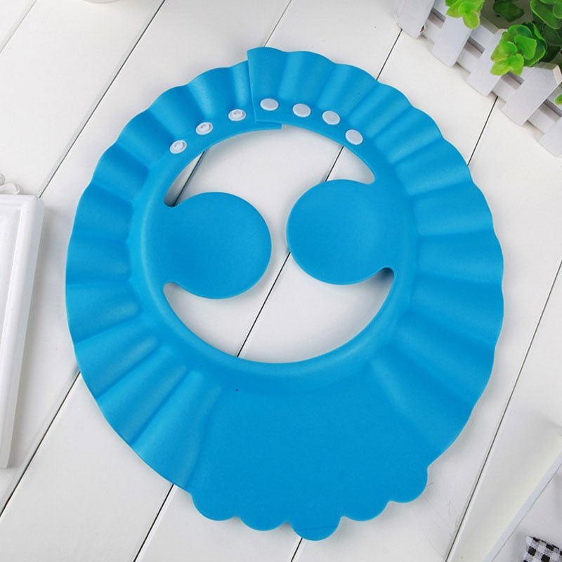 Visière chapeau pour douche bébé I ShampooCap™ - L'Univers des Petits